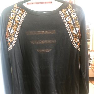 Black shirt with rust and cream stitch detail